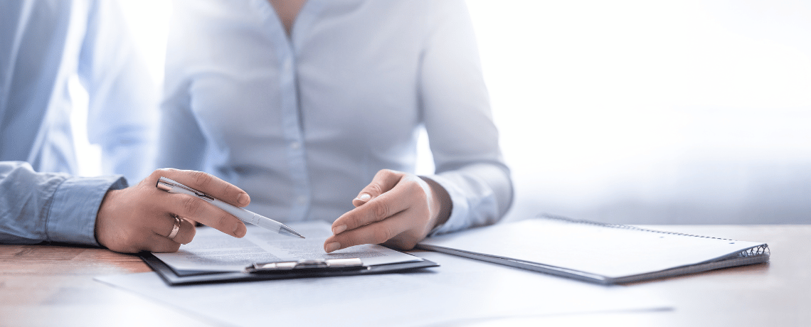 person examining merchant cash advance regulation